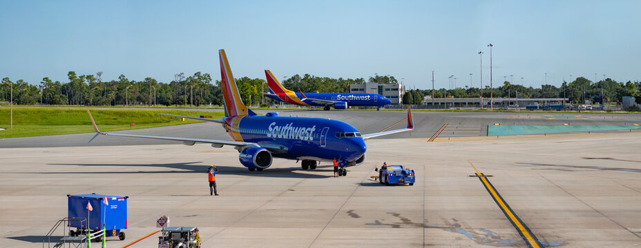 Miami, Florida, USA - August 06, 2025: Southwest Airlines. Boeing 737 MAX. Airplane terminal for airline. Southwest airline plane departure in airport. Airport terminal. Plane arrival, vacation
