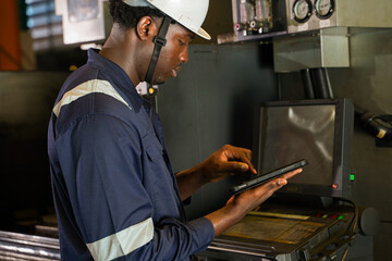 Professional quality control engineer inspecting precision automotive metal parts in a...