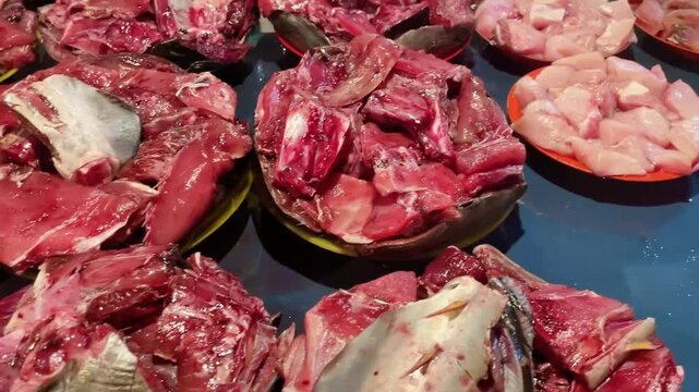 Fresh Raw Yellowfin Tuna Cuts at Traditional Fish Market 