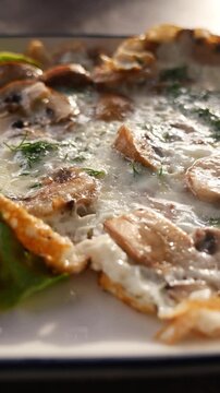 Mushroom omlet on a white plate 
