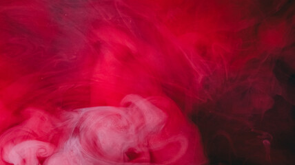 Naklejka premium Paint cloud texture. Underwater fog. Blur red pink purple color shimmer water glitter splash bright liquid spill on abstract background.