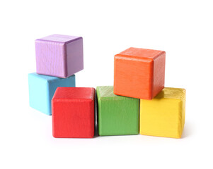 Colorful wooden cubes on white background
