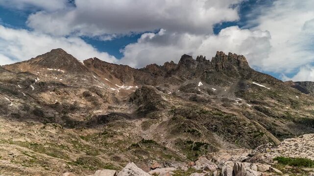 Clouds and shadows moving over jagged rock spires on a high mountain ridge, Beartooth Plateau, Montana, time lapse