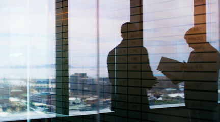 Silhouette, glass and team with business people in office for planning, b2b and realtor advisor....