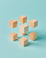 Obraz premium Network of wooden cubes connected by white strings representing community and teamwork on a teal studio background for business resource and social connection concepts