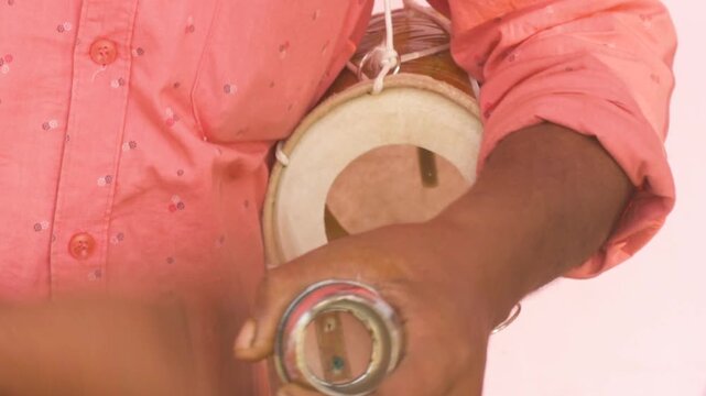 Baul Folk Singer Performing with Ektara at Rural Fair in Kolkata India