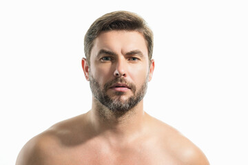 Close up portrait of half naked man 40s having bristle isolated over white background. Handsome serious man enjoy fresh perfect smooth skin. Portrait of a beautiful man with perfect faces skin.