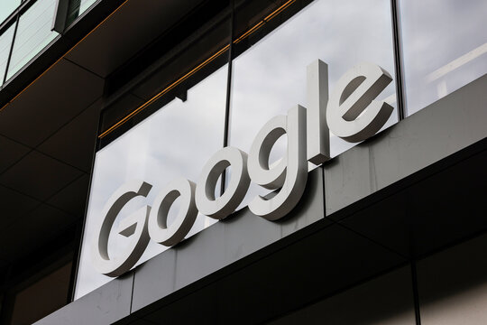 Exterior view of a Google office building with company logo displayed on the facade in Cambridge, Massachusetts