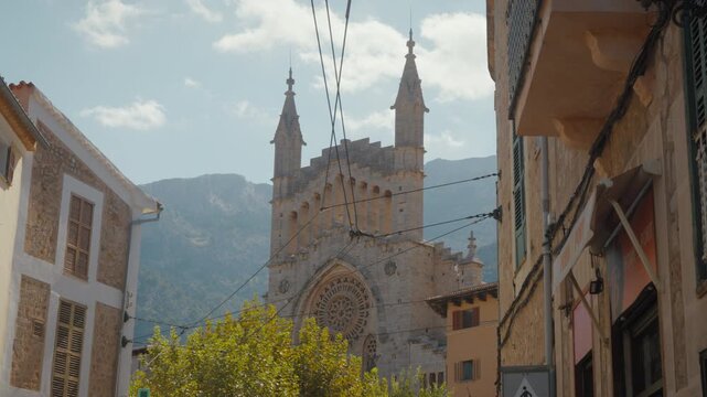 Charming Soller street view with stunning church architecture. Ideal for travel videos and documentaries.