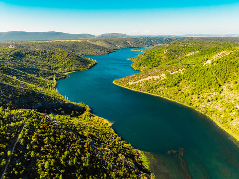 Aerial view of the confluence where the Cikola river lake drom torak view tributary joins the Krka river canyon, Krka National Park, Dalmatia, Croatia.