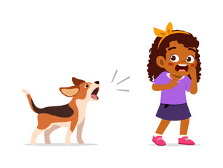 Obraz premium A barking dog scares an African American little girl who looks surprised and afraid with wide eyes