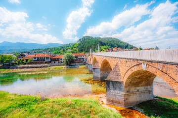Naklejka premium Old Stone Bridge (Stara Cuprija) over the Neretva River in Konjic, a masterpiece of Ottoman architecture, Bosnia and Herzegovina.