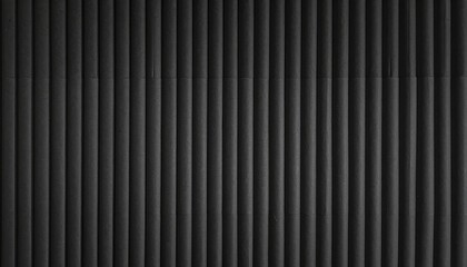 Vertical gray textured pipe wall, monochromatic, with slight gradient and cast shadow