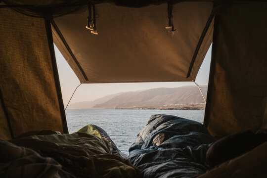 View from roof top tent of mountainous coastline in Oman