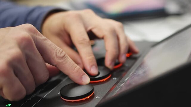 Control panel. Display. Man's hands. Sound remote.slow motion video. High quality 4k footage