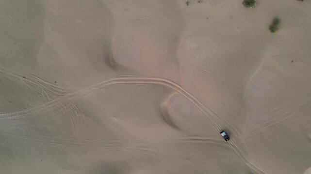 Aerial View of Tourists Enjoying Jeep Safari in Sand Dunes Jaisalmer Thar Desert India
