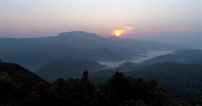Aerial Sunrise Over Misty Mountains of Coorg Karnataka India