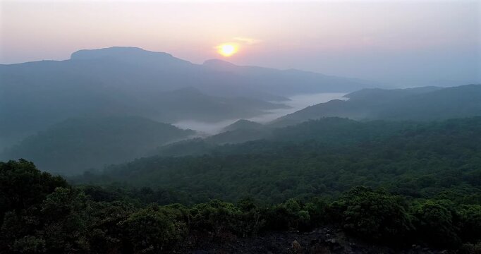 Aerial Sunrise Over Misty Mountains of Coorg Karnataka India