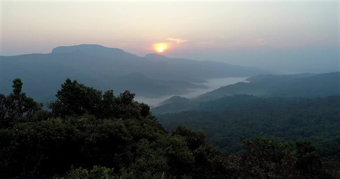 Aerial Sunrise Over Misty Mountains of Coorg Karnataka India