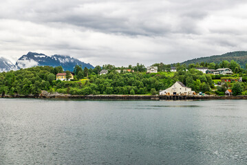 Fototapeta premium Sailing, Norwegian Sea, Alesund, Hjorundfjord, Finnmark, Norway, Arctic town, Norwegian fjords