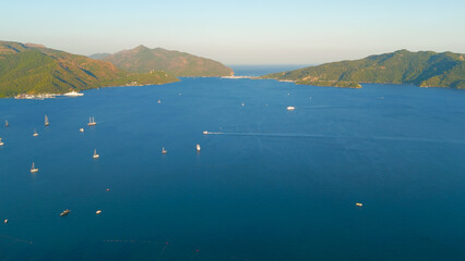Marmaris, Turkey. Marmaris Bay surrounded by forested mountains in spectacular sunset light. Golden...