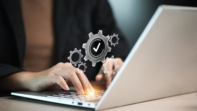 Business Workflow Automation and Process Optimization Concept with Gear System on Laptop