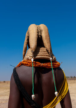 Mumuhuila tribe woman portrait wearing a huge necklace, Huila Province, Chibia, Angola