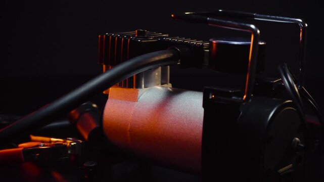 new 12 volt car compressor for inflating tires, works via cigarette lighter or battery clamps