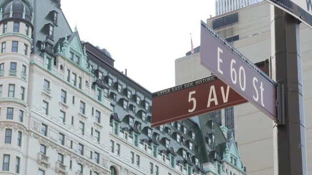 New York City Manhattan Midtown, United States. Old historic hotel building 1907 on Grand Army Plaza, 5 fifth avenue sign near Central Park. Classic iconic american architecture. Pulitzer Plaza in NYC