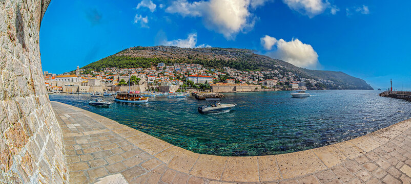 DUBROVNIK, CROATIA: View with Porporela (Ka&scaron;a) breakwater in the old town port, built in medieval time. St. John's Fortress built in 1522-1557. Included on the UNESCO list.