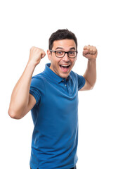 Young asian man with fists up in excitement