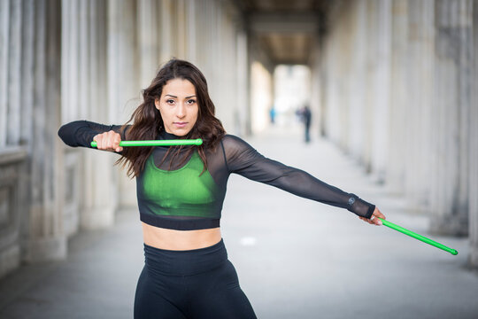 Young woman doing pound fitness exercise