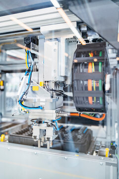 Intricate machinery inside modern factory, Stuttgart, Germany