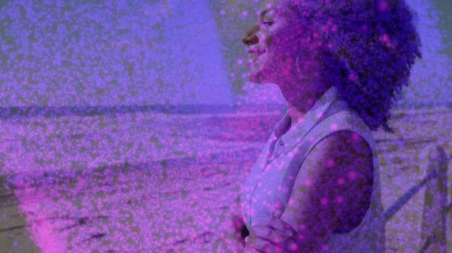 Woman at shore, breeze nudging head turn and relaxing smile, magenta overlay ghosting subject film