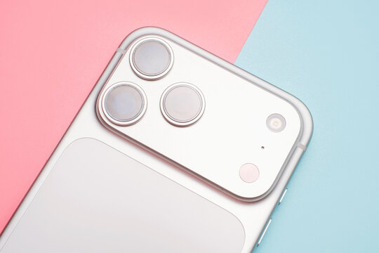 Seoul - 05.11.2025: iPhone 17 Pro Max on pink and blue background.