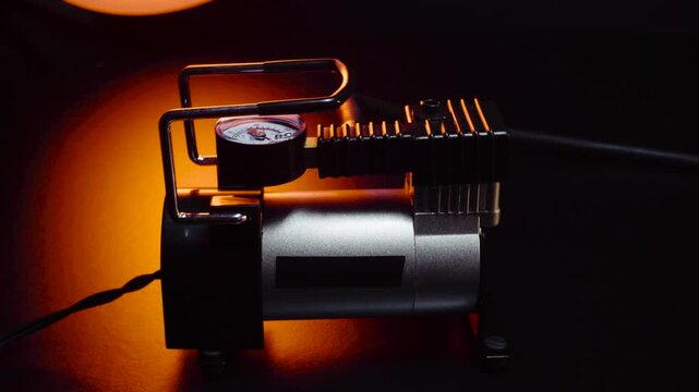 new 12 volt car compressor for inflating tires, works via cigarette lighter or battery clamps