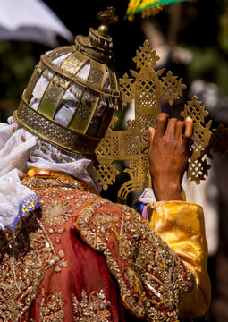 Ethiopian Orthodox Priest Holding A Cross During The Colorful Timkat Epiphany Festival, Lalibela, Ethiopia