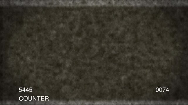 A close-up 4K view of a textured counter surface with numerical labels displayed prominently in a dark environment