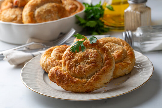 Traditional delicious Turkish phyllo stuffed with spinach, cheese (Turkish name; Gul borek or gul boregi) Rose shaped pastry.