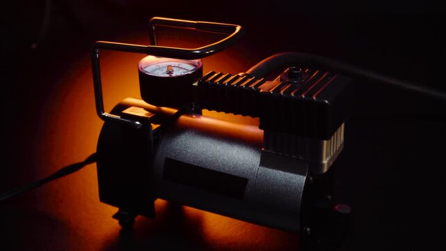 new 12 volt car compressor for inflating tires, works via cigarette lighter or battery clamps