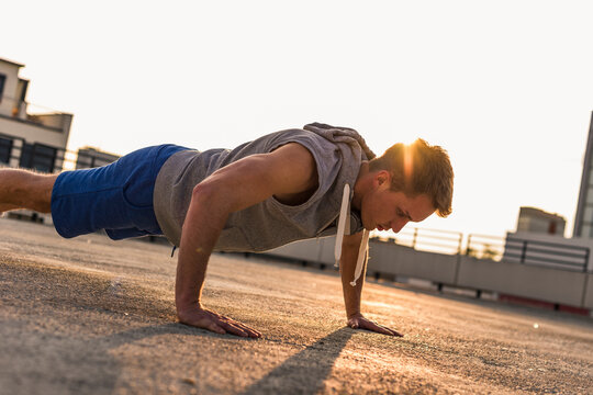 Young man exercing push ups