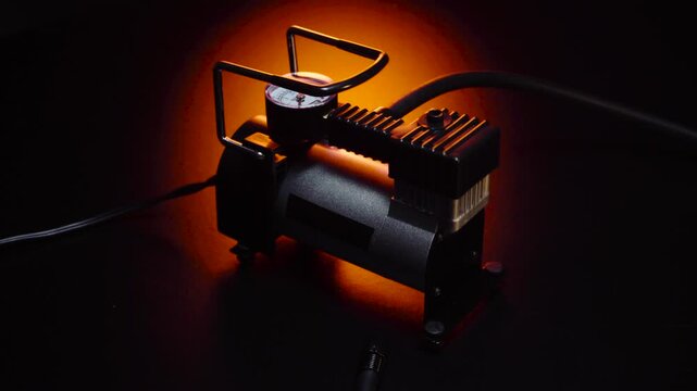 new 12 volt car compressor for inflating tires, works via cigarette lighter or battery clamps