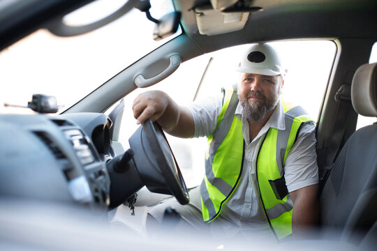 Quarry worker entering car