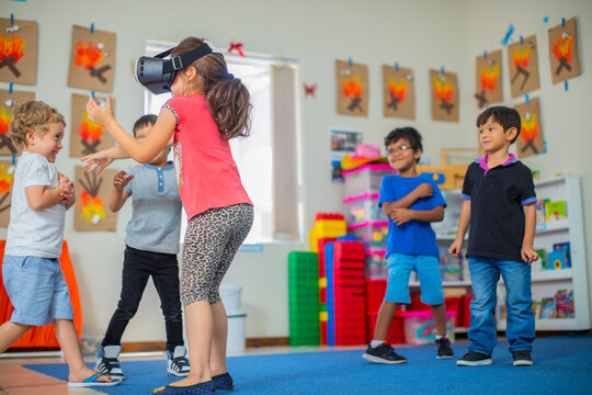 Children with VR glasses playing in kindergarten