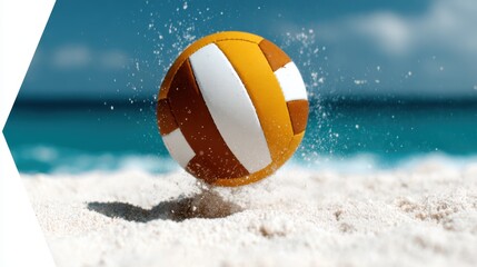 Obraz premium A bright and compelling beach volleyball bounces on sandy shores, capturing the essence of summer fun and active lifestyle by the crystal-clear ocean.
