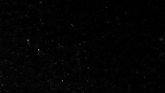 Dark Dust Texture Background. Distressed black surface featuring white organic fibers, scratches, and grain. Ideal for vintage film overlays and moody motion graphics projects.