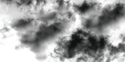 Naklejka premium Dark and stormy clouds in black and white with high contrast creating a dramatic background texture