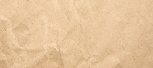 Fototapeta premium Abstract crumpled and creased recycle brown paper texture background
