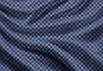 Obraz premium Halftone dot texture overlay on blue fabric folds creating retro pattern