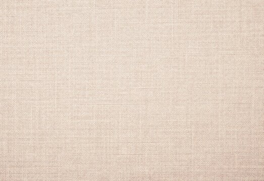 Beige linen fabric texture background close-up with subtle woven pattern